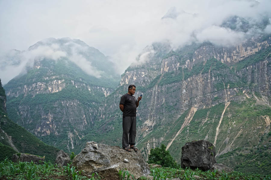 Children scale 800-meter cliff on way to school