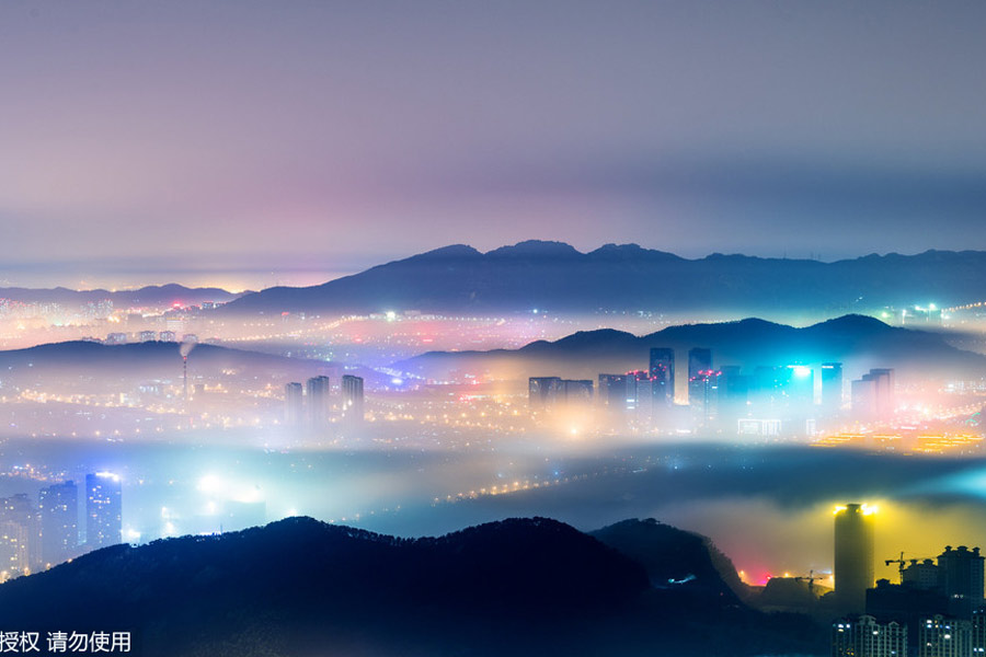 Fog turns Qingdao city into a fairyland