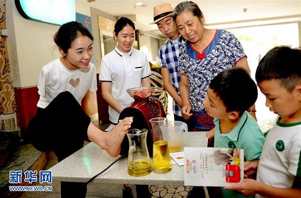 Armless woman keeps fighting for better life