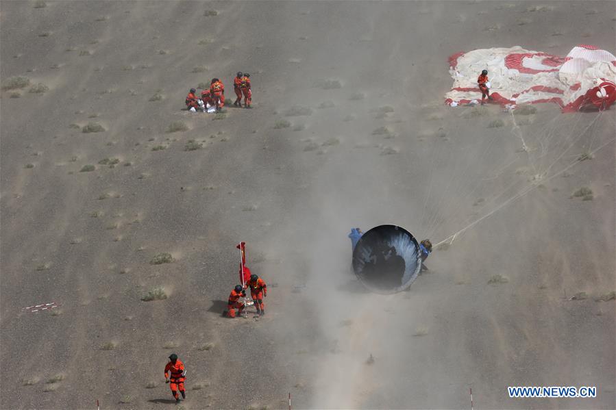 Reentry module aboard Long March-7 lands successfully