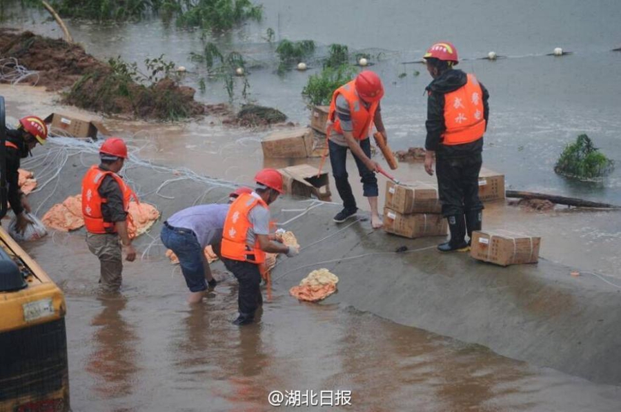 Dam's floodway blasted to discharge water in Hubei province