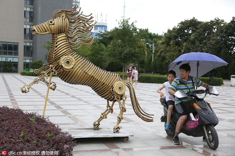 Students turn scrap parts into animal statues