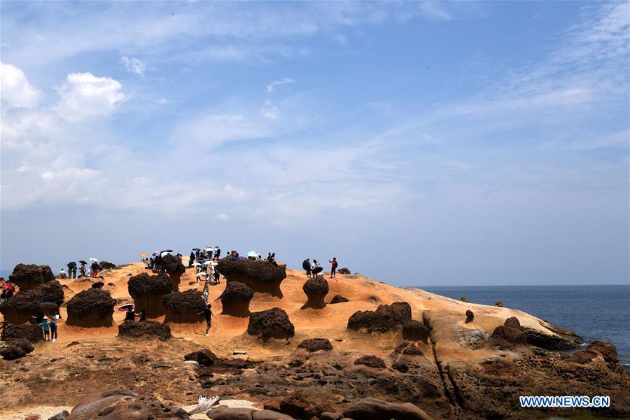 Tourists visit Yehliu Geopark in New Taipei of SE China's Taiwan