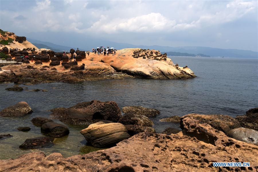 Tourists visit Yehliu Geopark in New Taipei of SE China's Taiwan