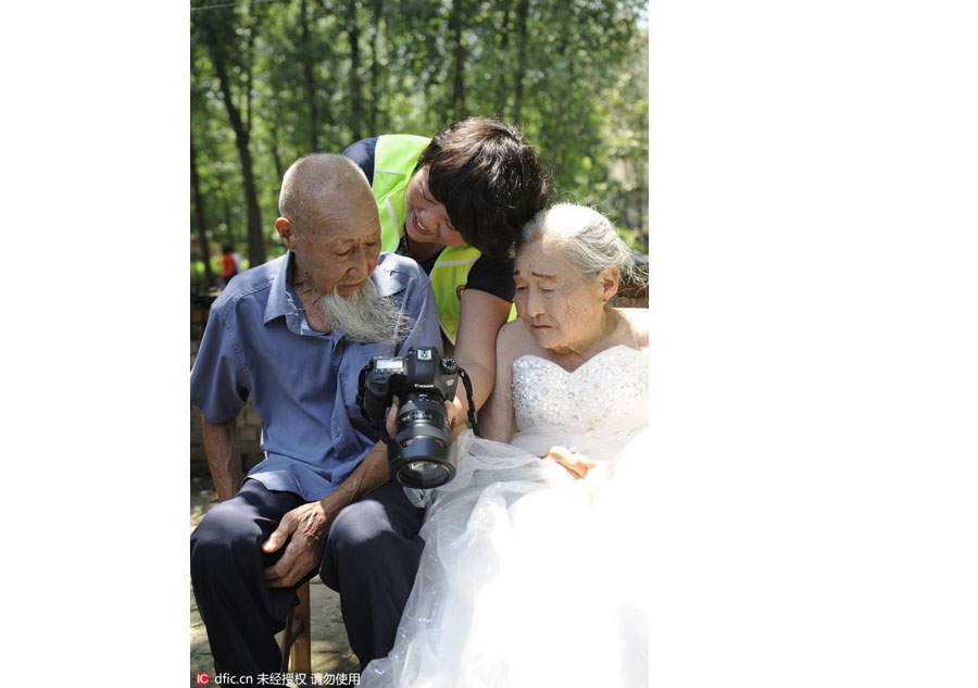 Centenarian couple embrace diamond wedding anniversary