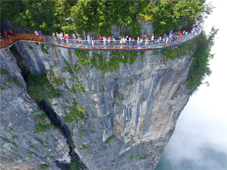 Not for the faint-hearted: Glass bridge opens in Hunan