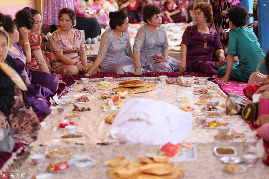 Dancing, food and religion, all in a Xinjiang wedding