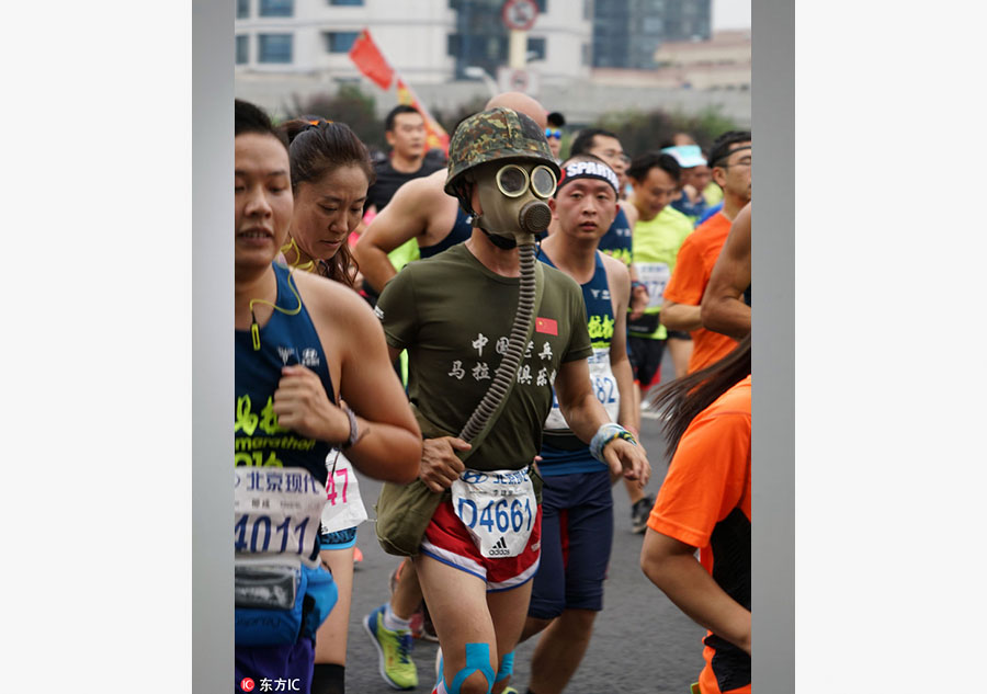 Runners compete during Beijing marathon