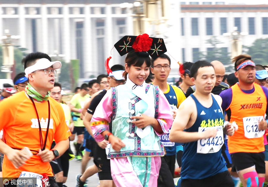 Runners compete during Beijing marathon