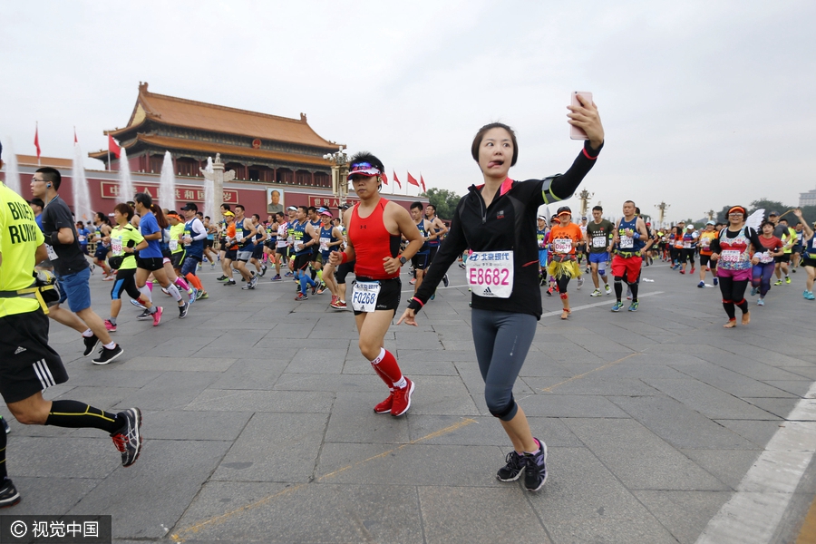Runners compete during Beijing marathon