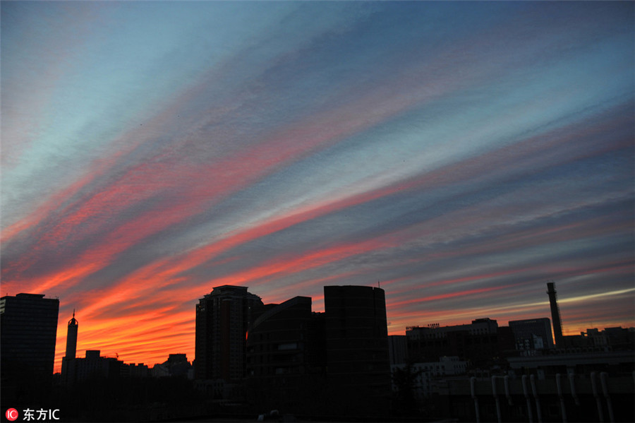 Beijing wakes to rosy dawn