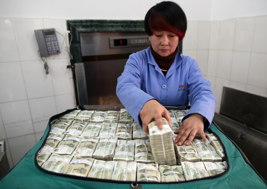 Cramped fingers, 24-hour security and sticky tape all part of a money counter's job