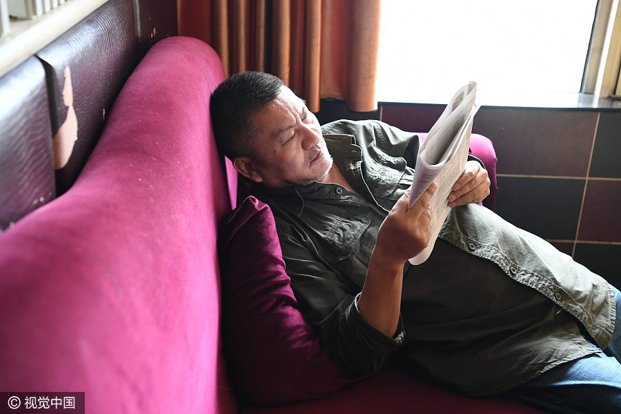 50-year-old attempts <EM>Gaokao </EM>for 21st time