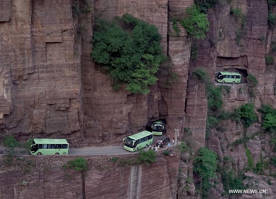 In pics: Miraculous road at Guoliang cliff corridor in Henan