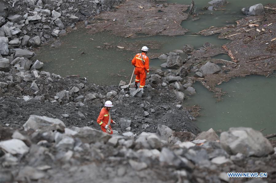 Rescue work underway after SW China's devastated landslide