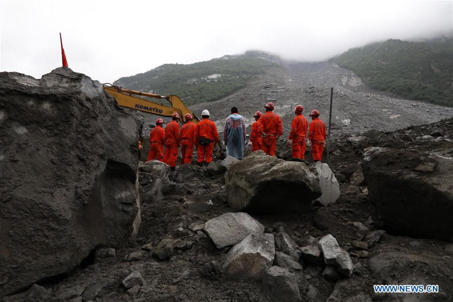 Rescue work underway after SW China's devastated landslide