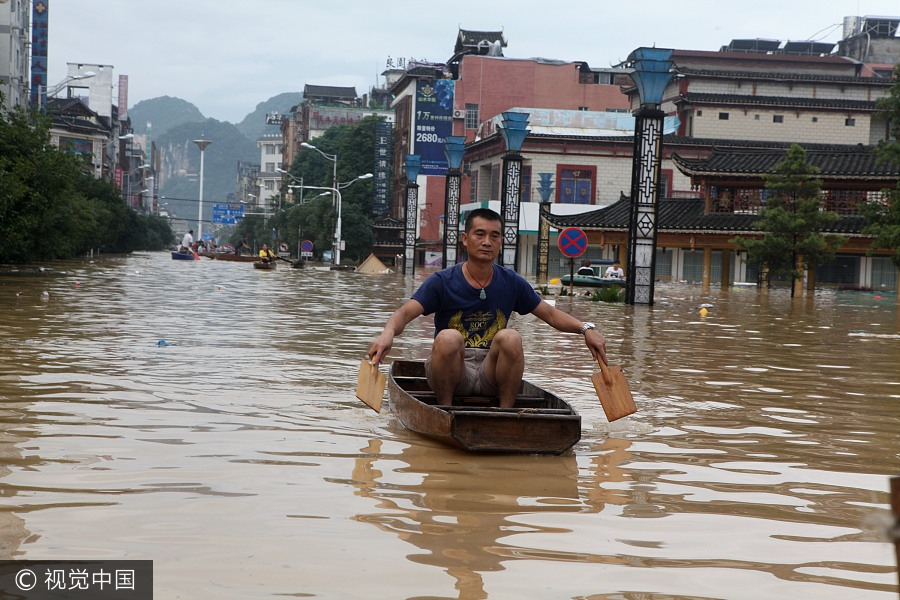 Row, row, row your boat! Life in flooded Guangxi