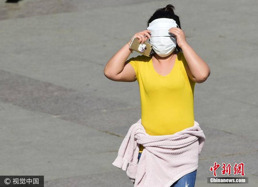 Anything goes as a hat in China's hot summers