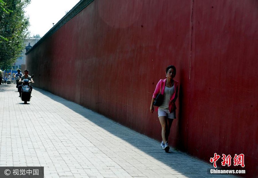 Anything goes as a hat in China's hot summers