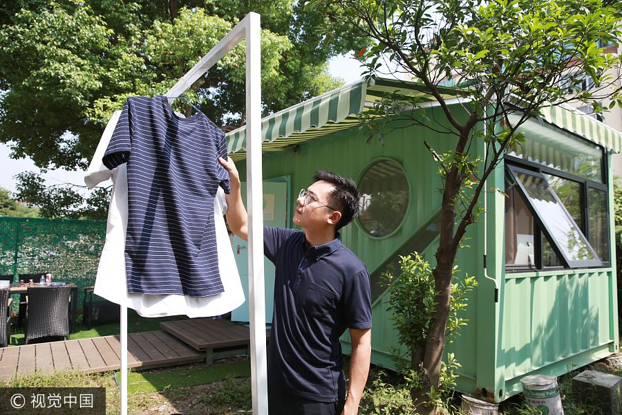 Businessman makes home in container