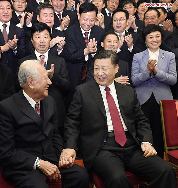 Xi shows great respect for two aged honorees