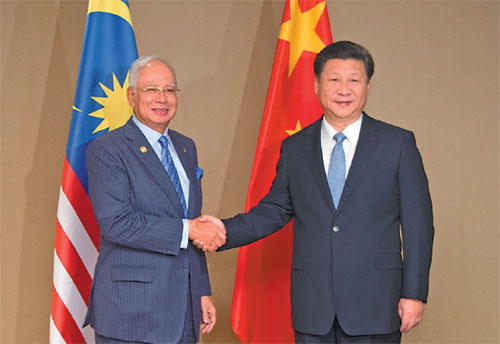 Xi vows to boost Malaysian ties