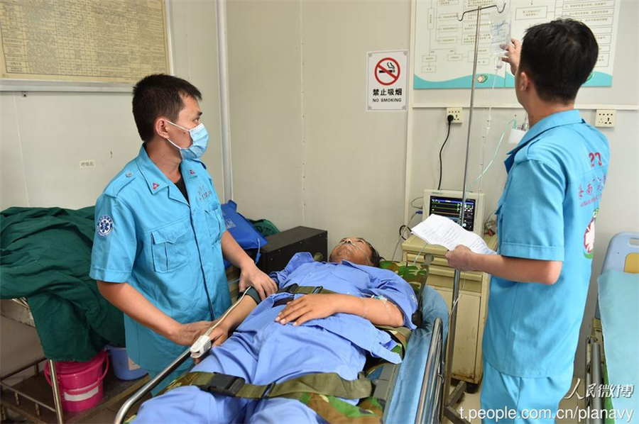 PLA plane lands at Yongshu Jiao reef to help patients