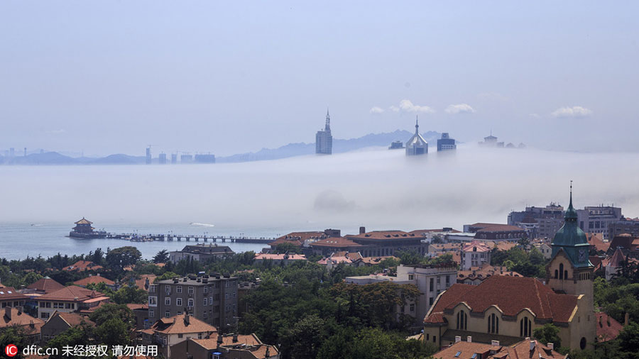 Rising above the clouds: Mist envelops Qingdao