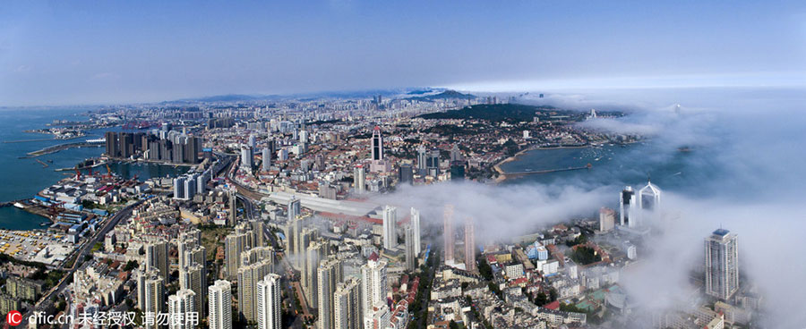 Rising above the clouds: Mist envelops Qingdao