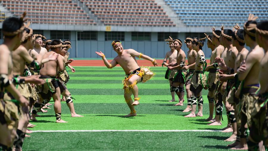 Students try unusual folk dance