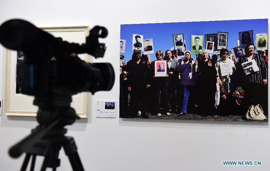 'War and Peace' photography exhibition held in Wuhan