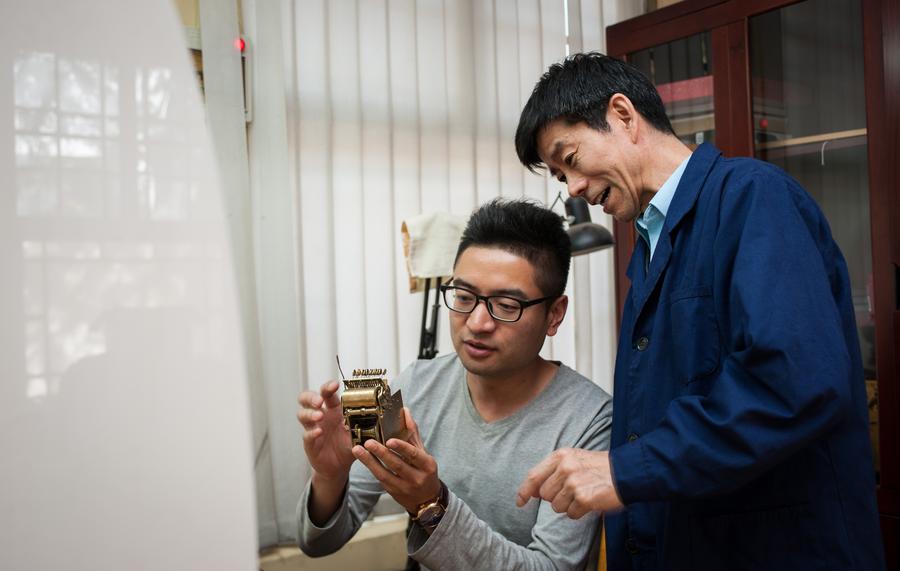 Clock repairman at Palace Museum keeps history in time