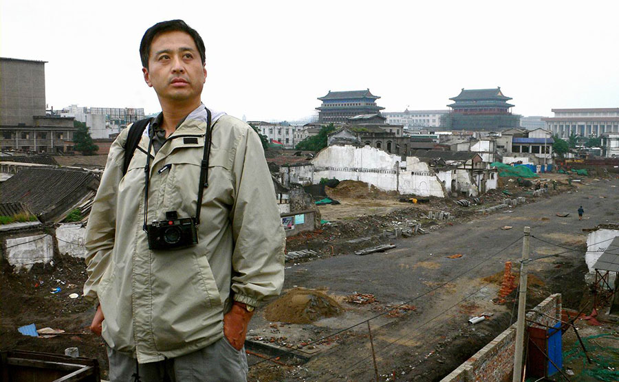 Photo exhibition narrates charm of old Beijing