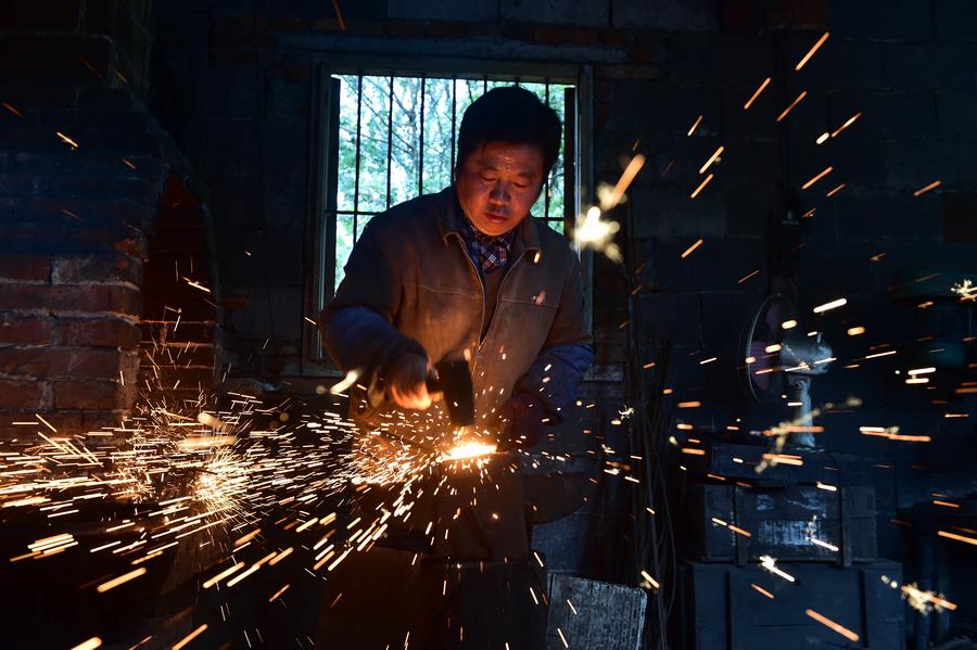 Craftsman makes scissors in traditional way