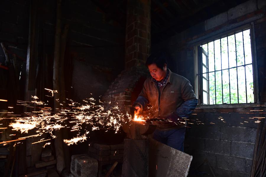 Craftsman makes scissors in traditional way