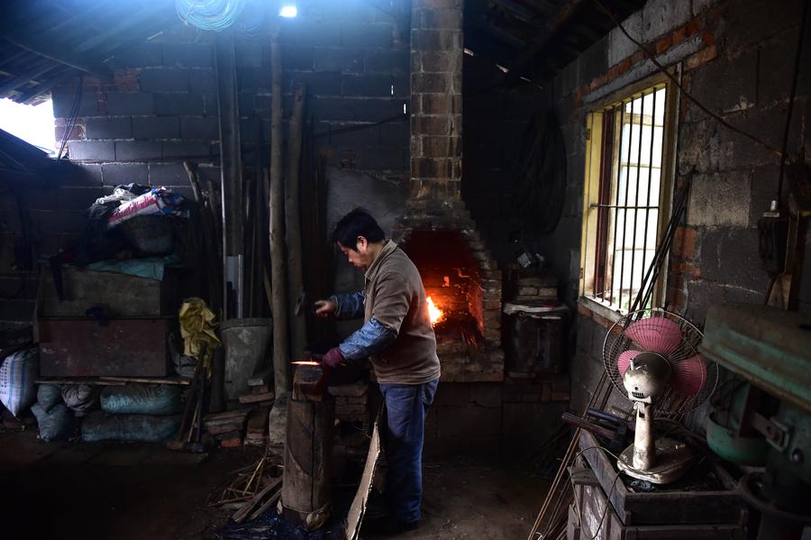 Craftsman makes scissors in traditional way