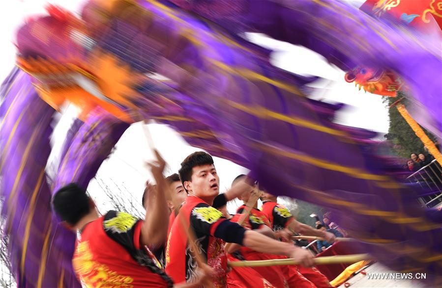 People perform dragon dance in Wuhan