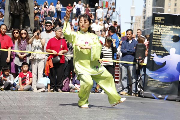 Tai chi lights up Times Square