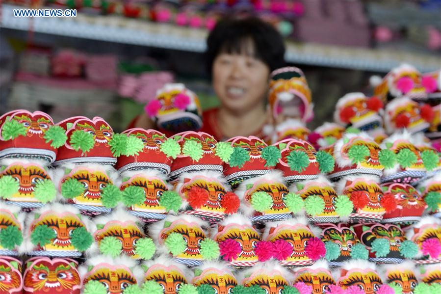 Tiger-head shoes made in N China's Hebei