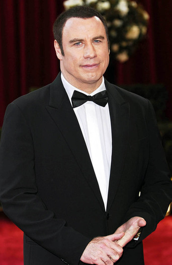 John Travolta sings for son