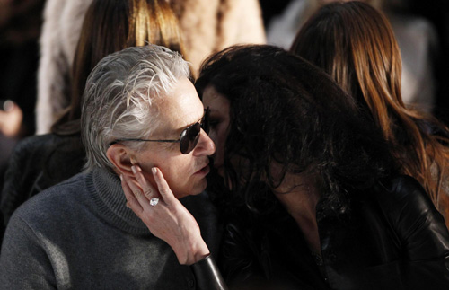 Michael Douglas and Catherine Zeta-Jones attend a showing of the Michael Kors Fall/Winter 2011 collection