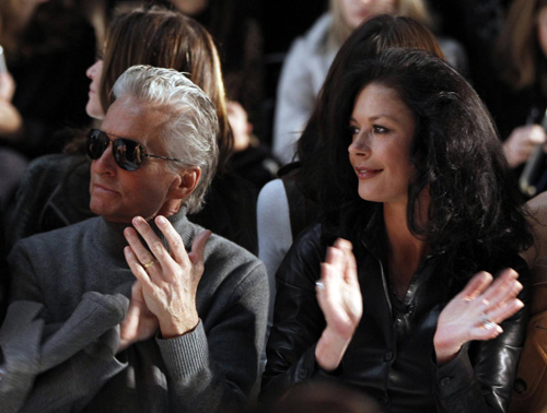 Michael Douglas and Catherine Zeta-Jones attend a showing of the Michael Kors Fall/Winter 2011 collection