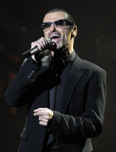 George Michael performs during his concert in Prague