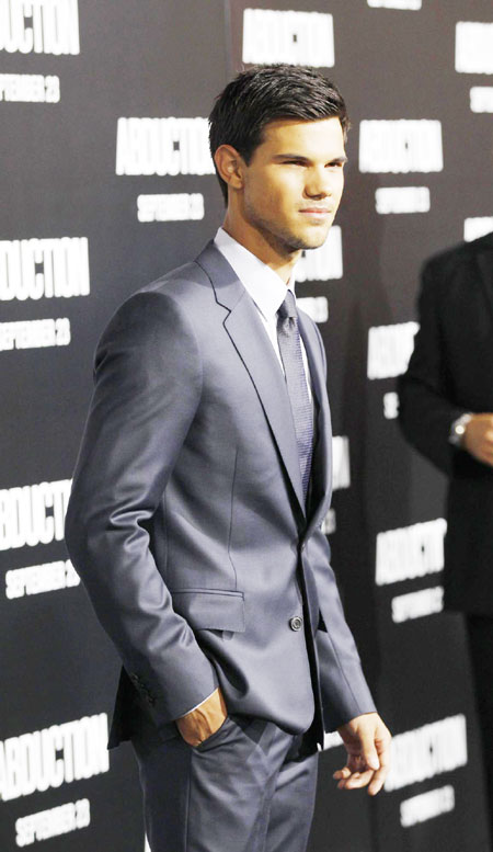 Taylor Lautner attends 'Abduction' world premiere