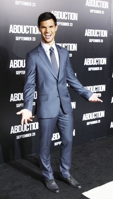 Taylor Lautner attends 'Abduction' world premiere