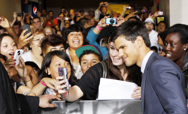 Taylor Lautner attends 'Abduction' world premiere