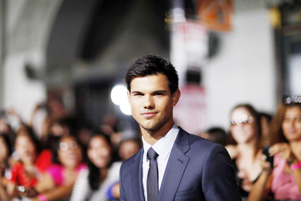 Taylor Lautner attends 'Abduction' world premiere