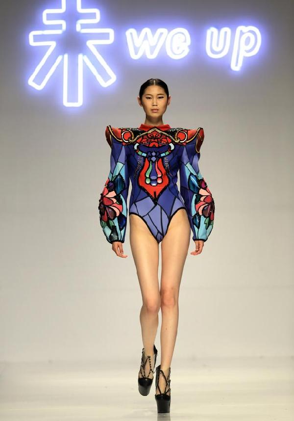 Designers present creations at China Fashion Week<BR>