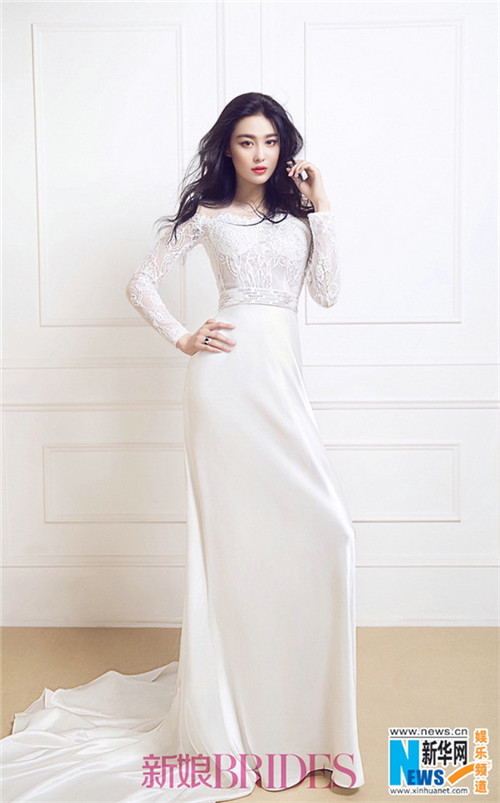 Elegant Zhang Xinyu poses for BRIDES magazine