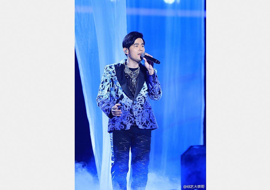 Zhang Lei wins fourth season of <EM>Voice of China</EM>